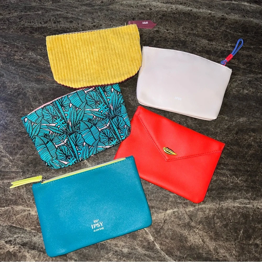 Ispy cosmetic bags 5 different prints all new not used